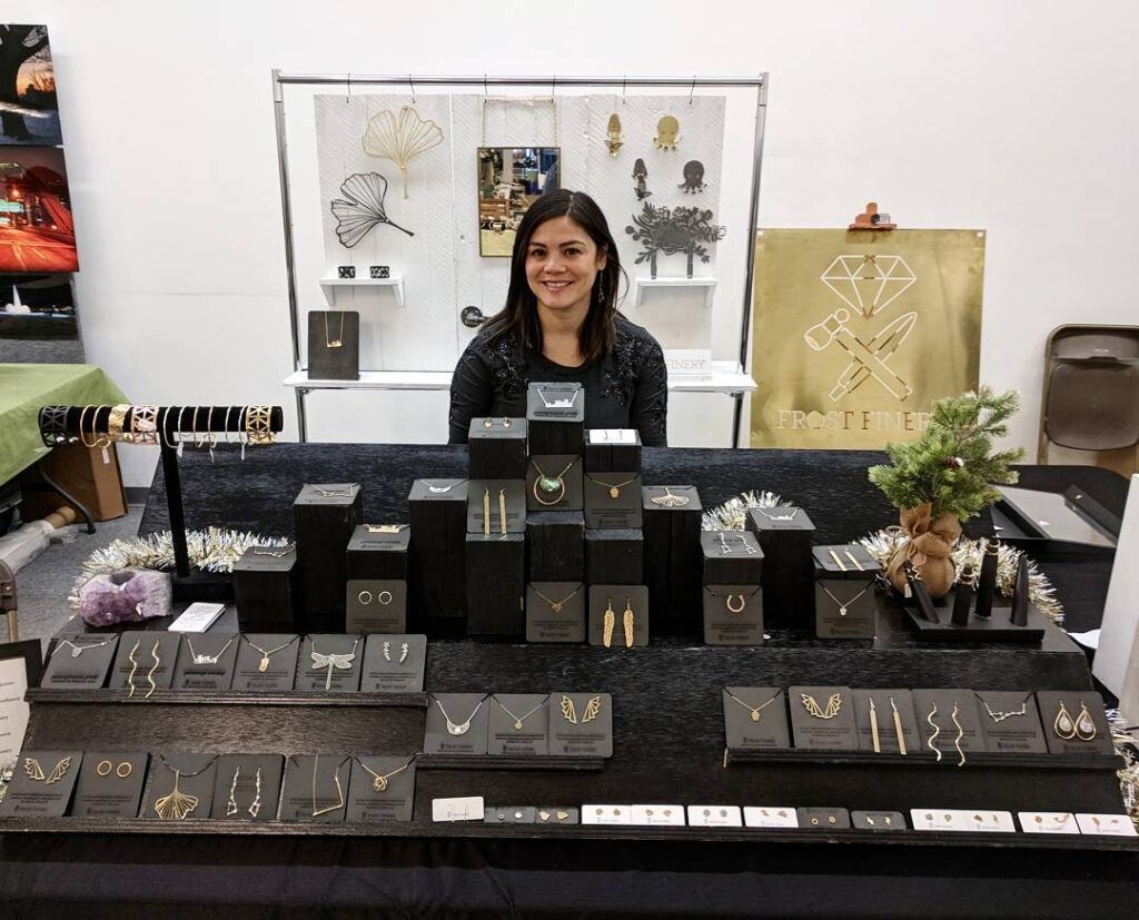 Melissa Frost at her Frost Finery table at a holiday market