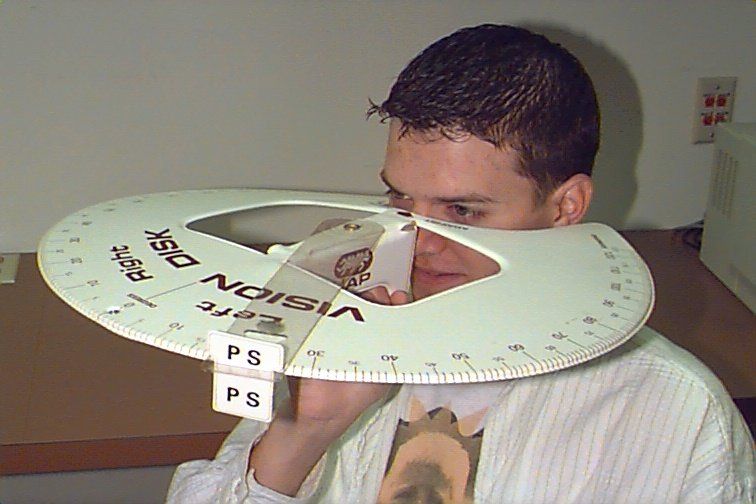 Guy with peripheral vision testing tool